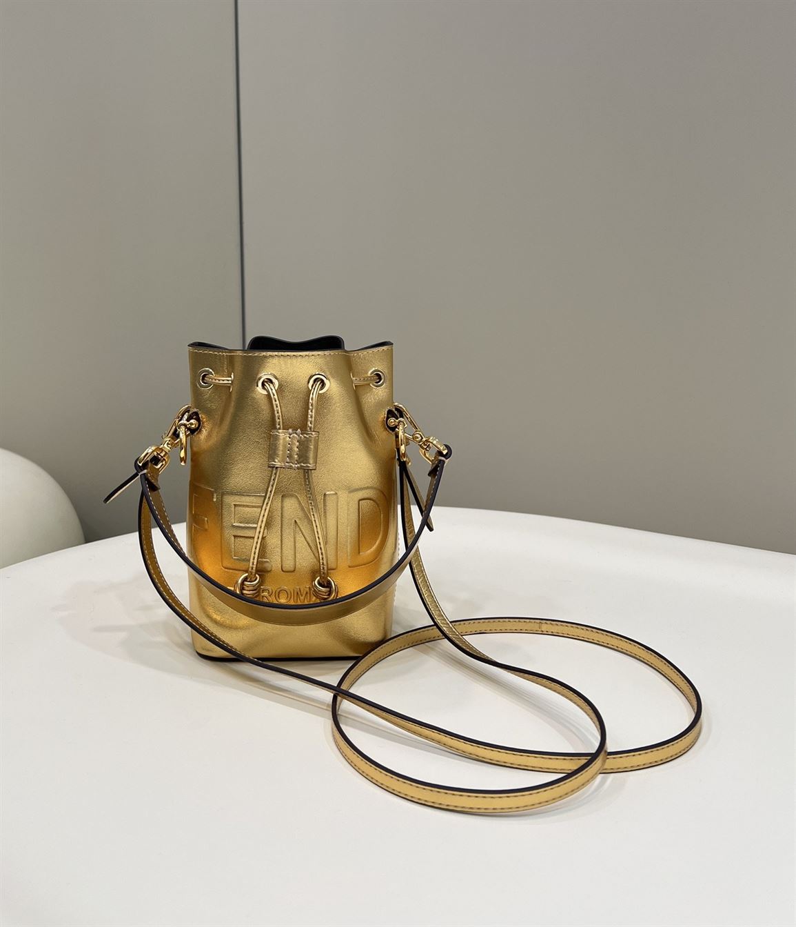 Mon Tresor Gold laminated leather mini bag – FB010