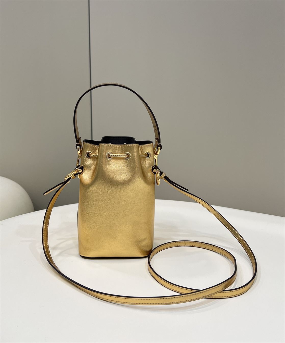 Mon Tresor Gold laminated leather mini bag – FB010