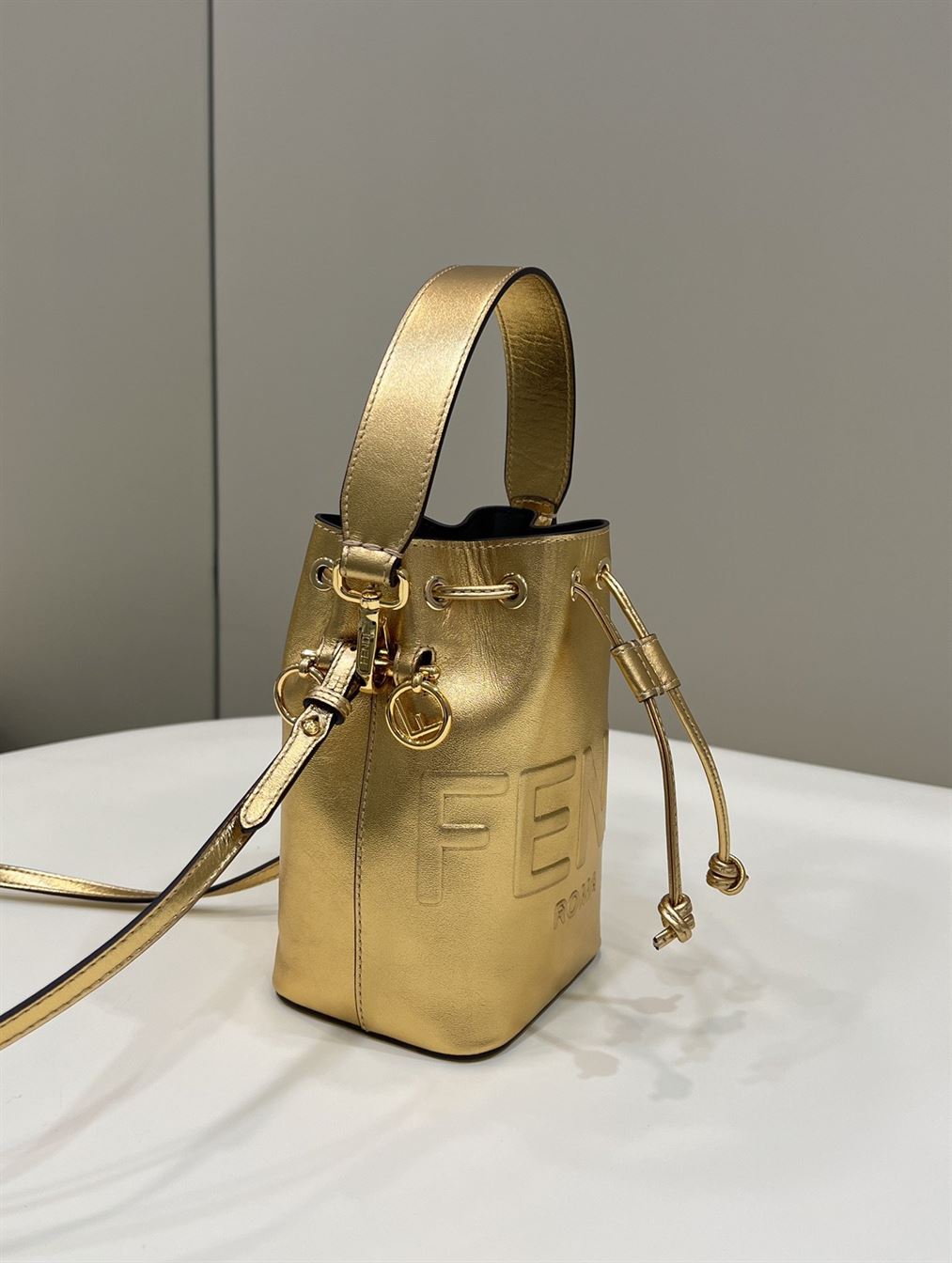 Mon Tresor Gold laminated leather mini bag – FB010