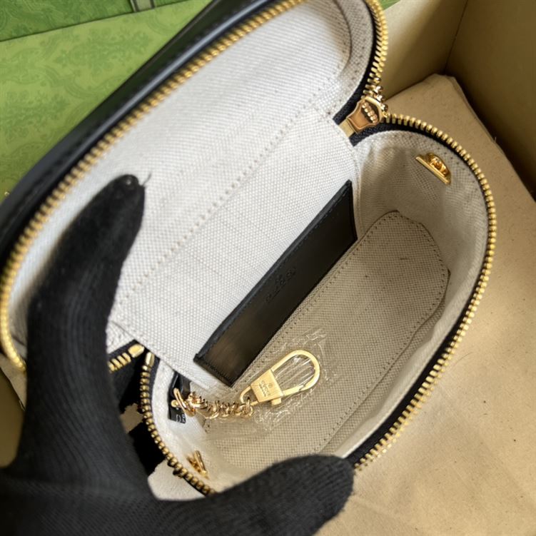 GG Matelassé top handle mini bag Black leather – GB132