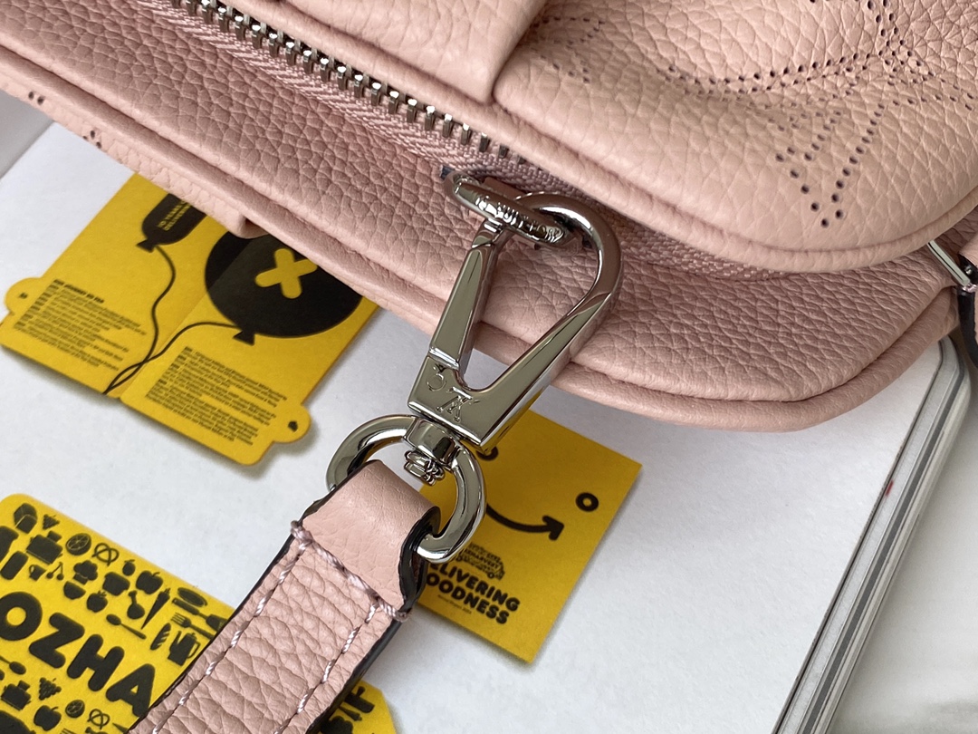 Scala mini pouch Pink Mahina perforated calf leather – LB179