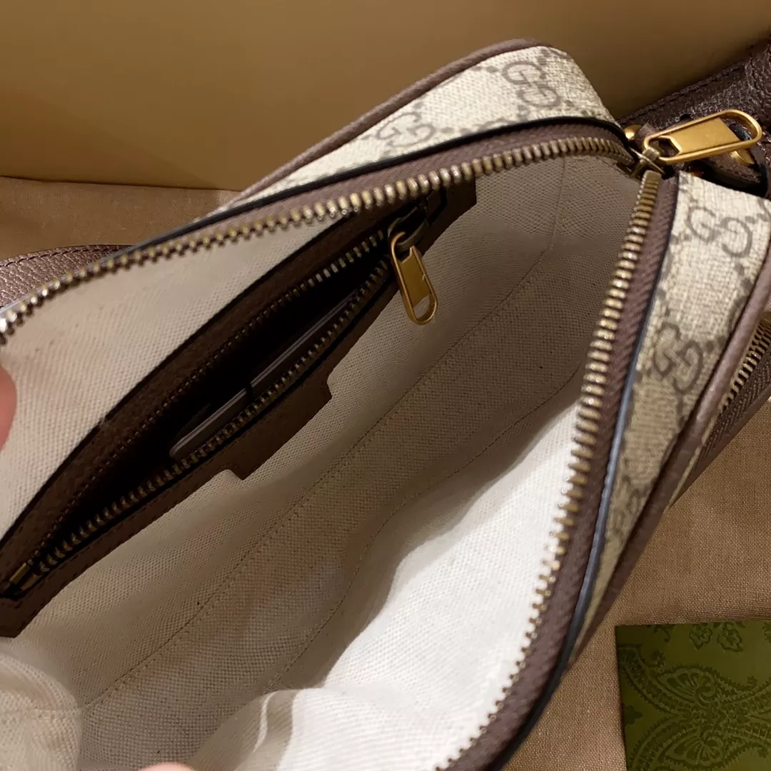 G*u*i man brown shoulder bag