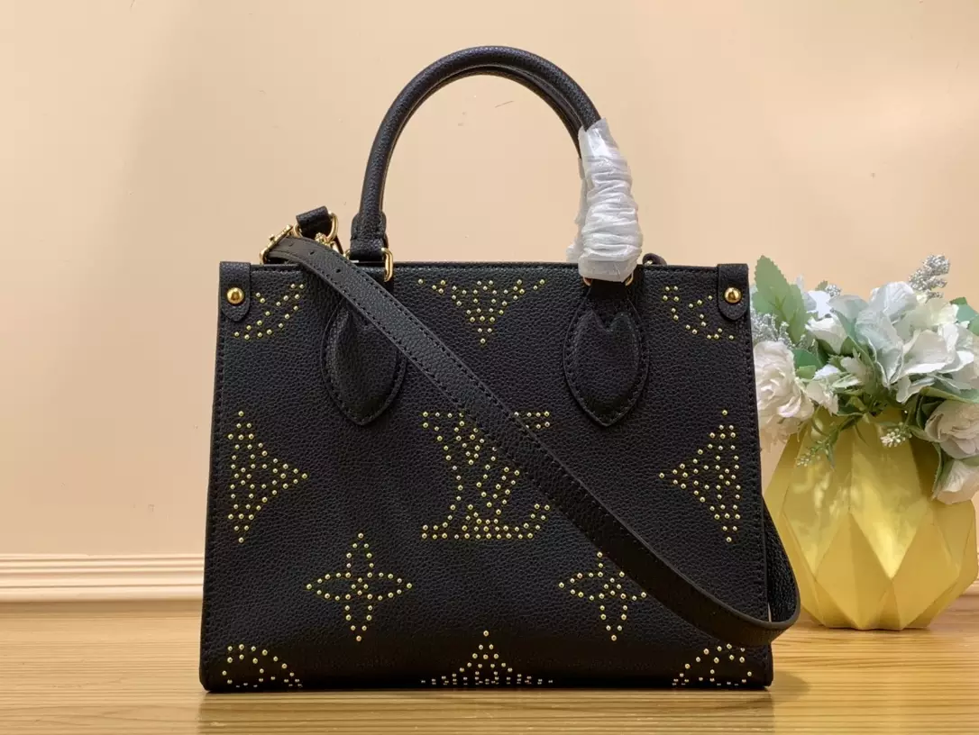 OnTheGo PM Monogram Empreinte Grained Cowhide Leather
