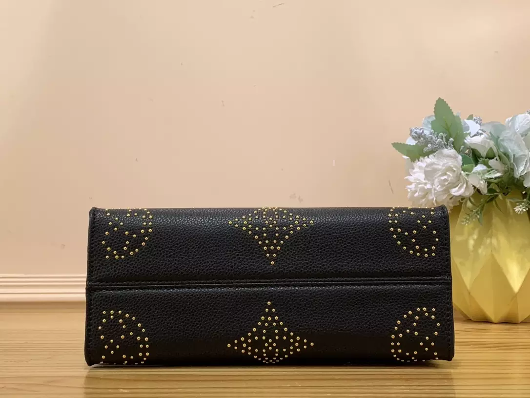 OnTheGo PM Monogram Empreinte Grained Cowhide Leather