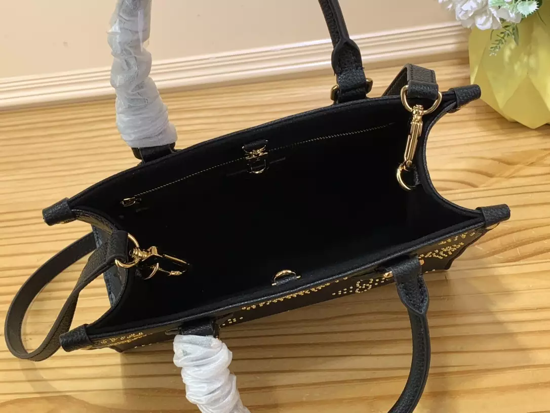 OnTheGo PM Monogram Empreinte Grained Cowhide Leather