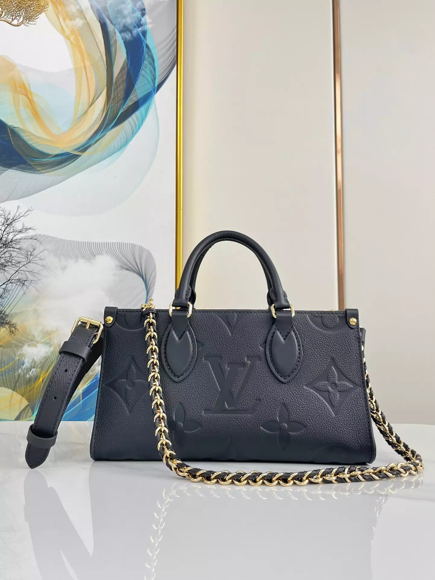 OnTheGo East West Monogram Empreinte Black Leather