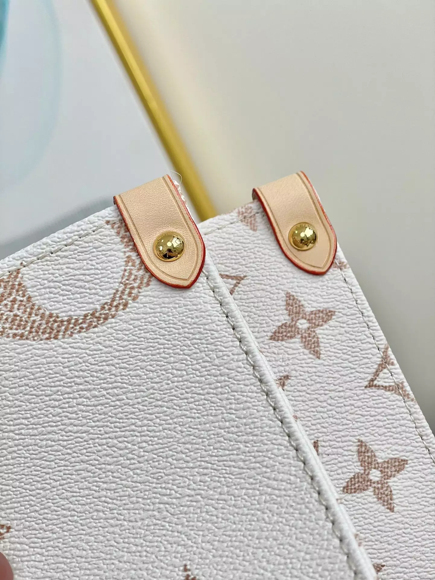 OnTheGo MM Monogram Dune Coated Canvas