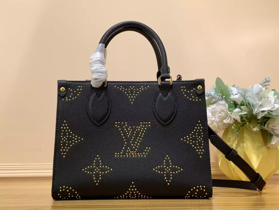 OnTheGo PM Monogram Empreinte Grained Cowhide Leather