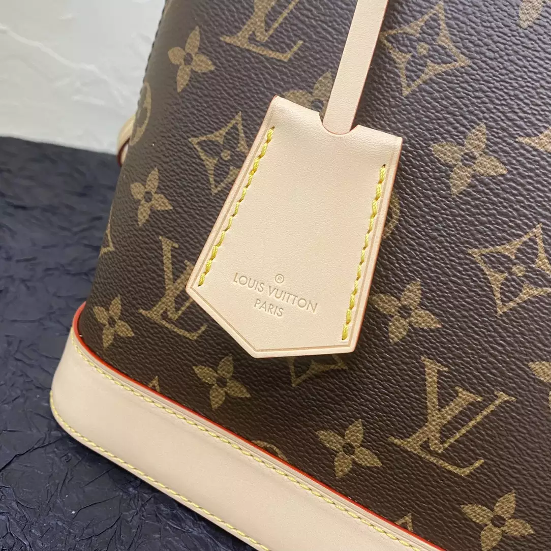 Alma Backpack Monogram Coated Canvas