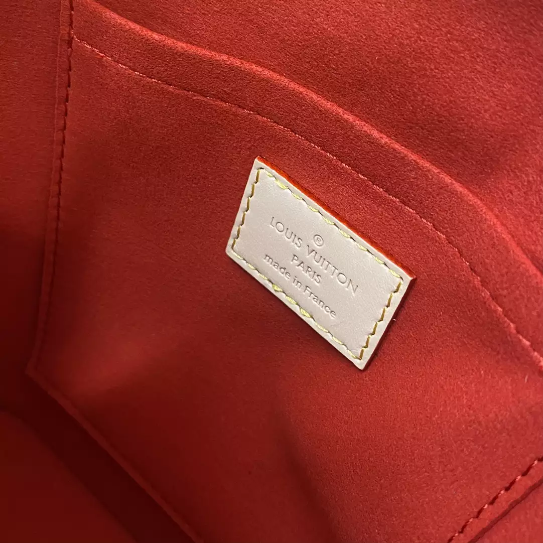 Alma Backpack Monogram Coated Canvas