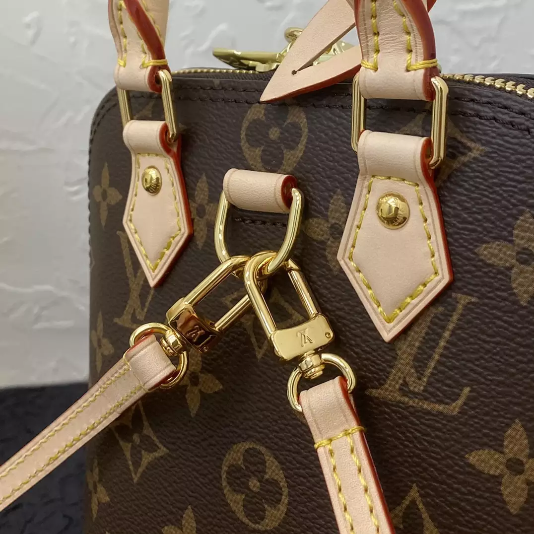 Alma Backpack Monogram Coated Canvas