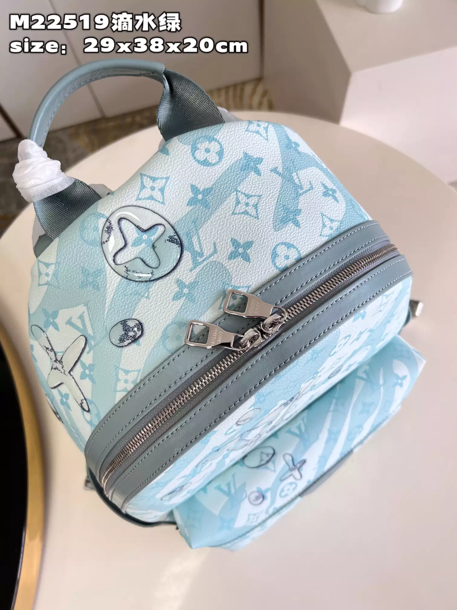 Discovery Backpack Monogram Aquagarden Canvas Crystal Blue Leather