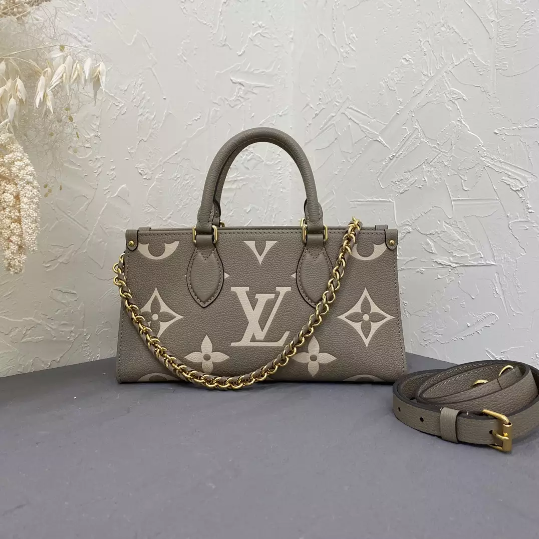 OnTheGo East West Bicolor Monogram Empreinte Dove Gray/Cream Leather