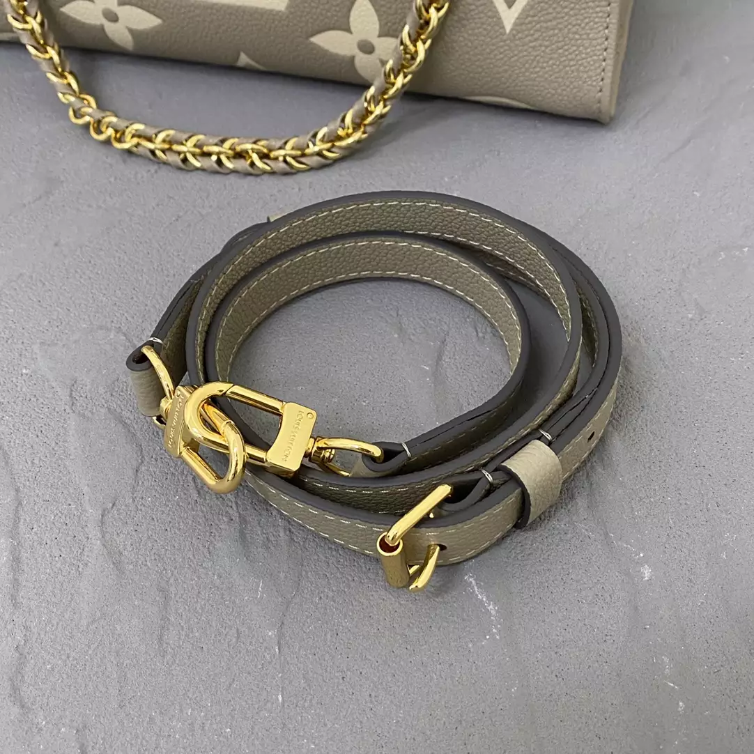 OnTheGo East West Bicolor Monogram Empreinte Dove Gray/Cream Leather