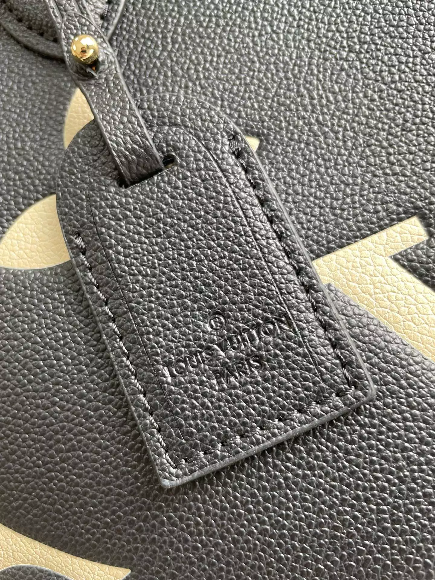 OnTheGo MM Bicolor Monogram Empreinte Black/Cream Leather