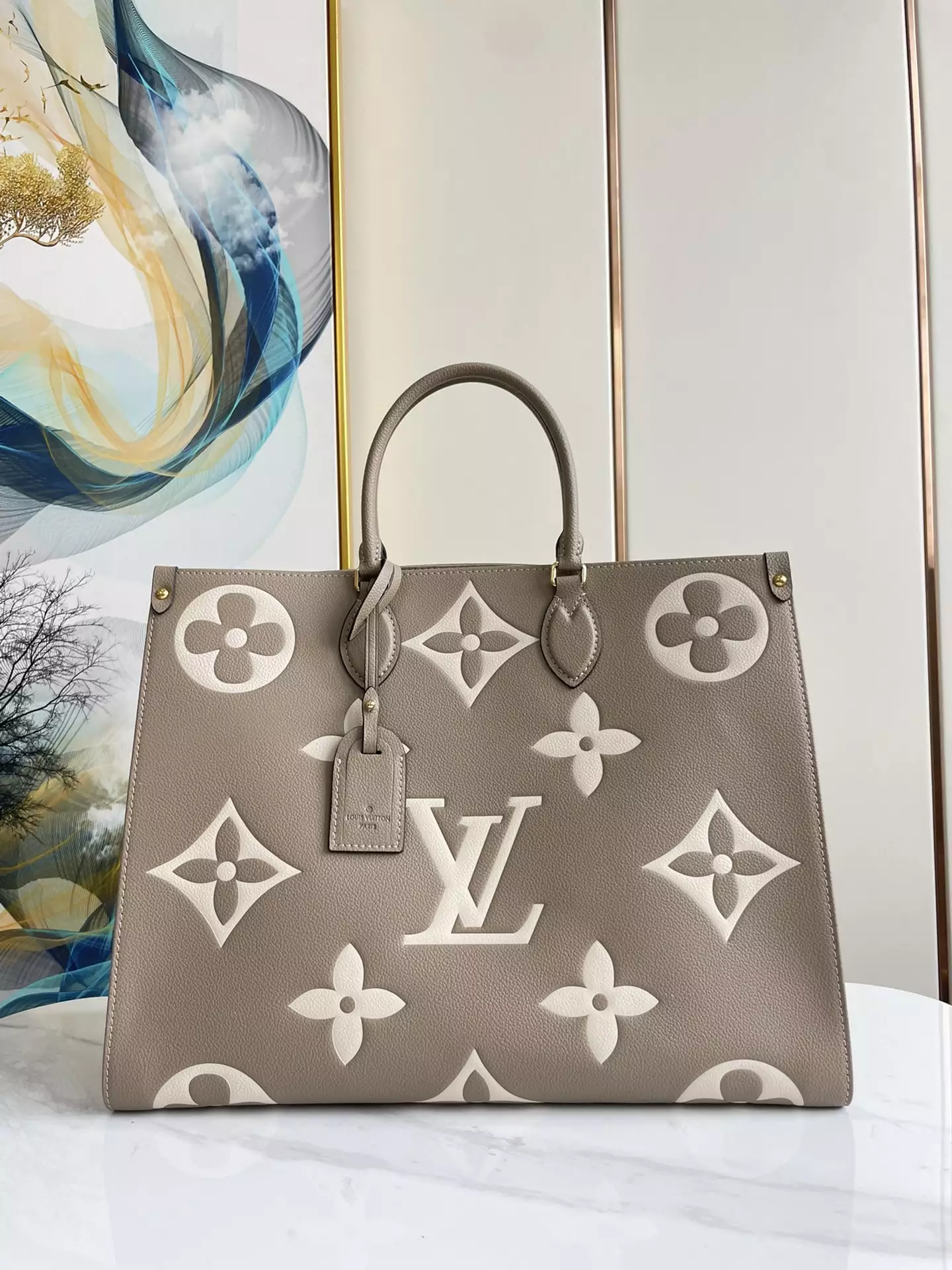 OnTheGo MM Bicolor Monogram Empreinte Dove Grey/Cream Leather