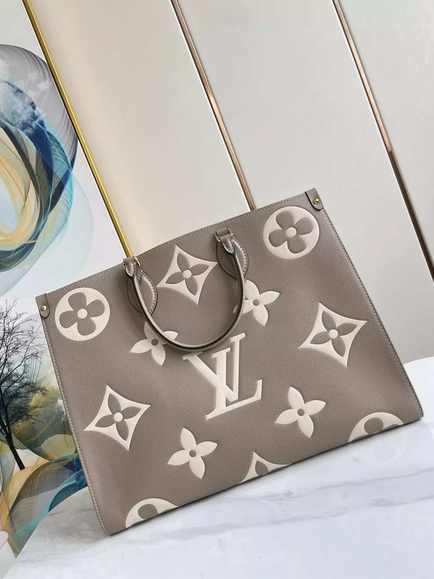 OnTheGo MM Bicolor Monogram Empreinte Dove Grey/Cream Leather