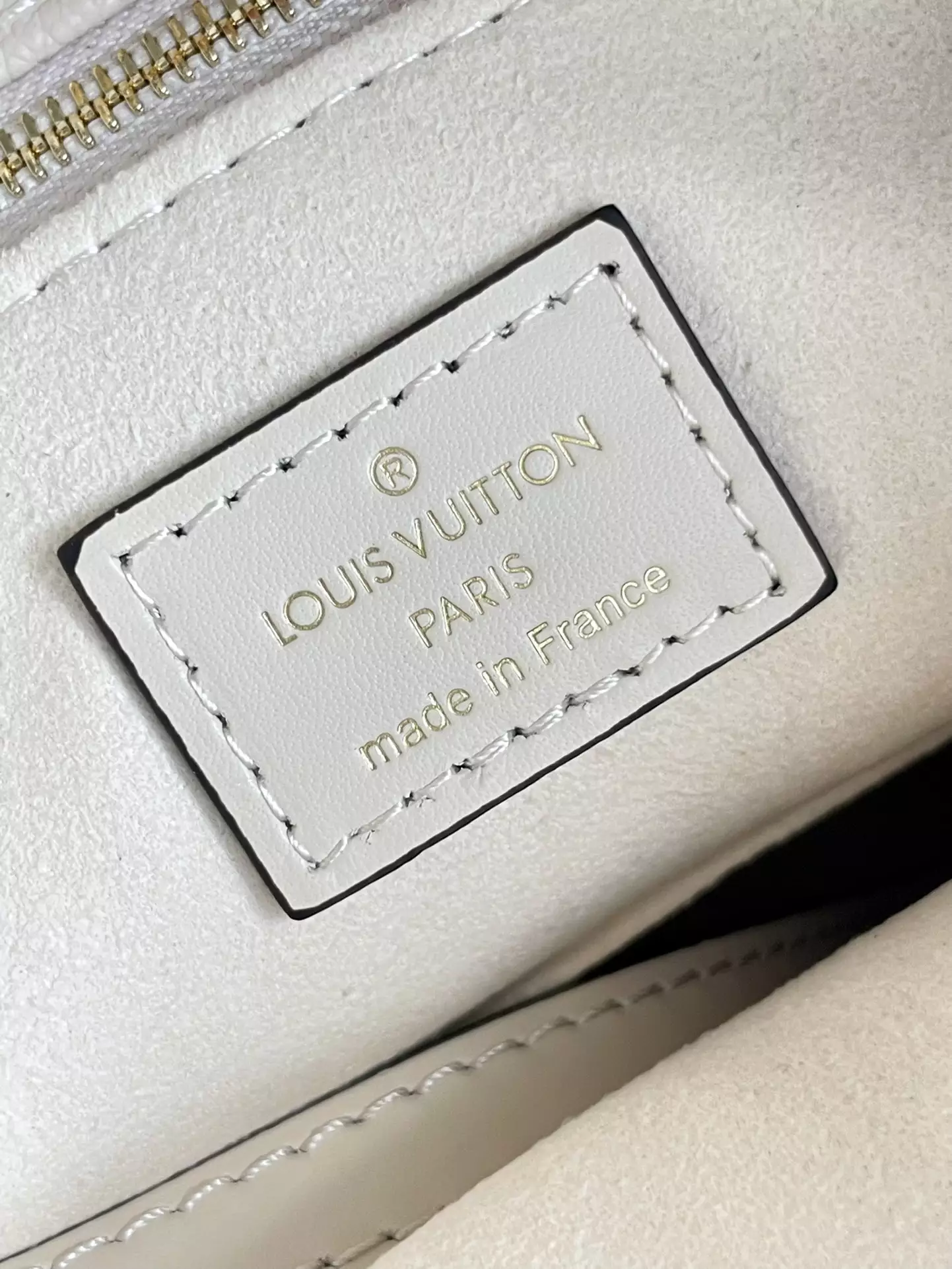 OnTheGo MM Monogram Empreinte Cream Leather