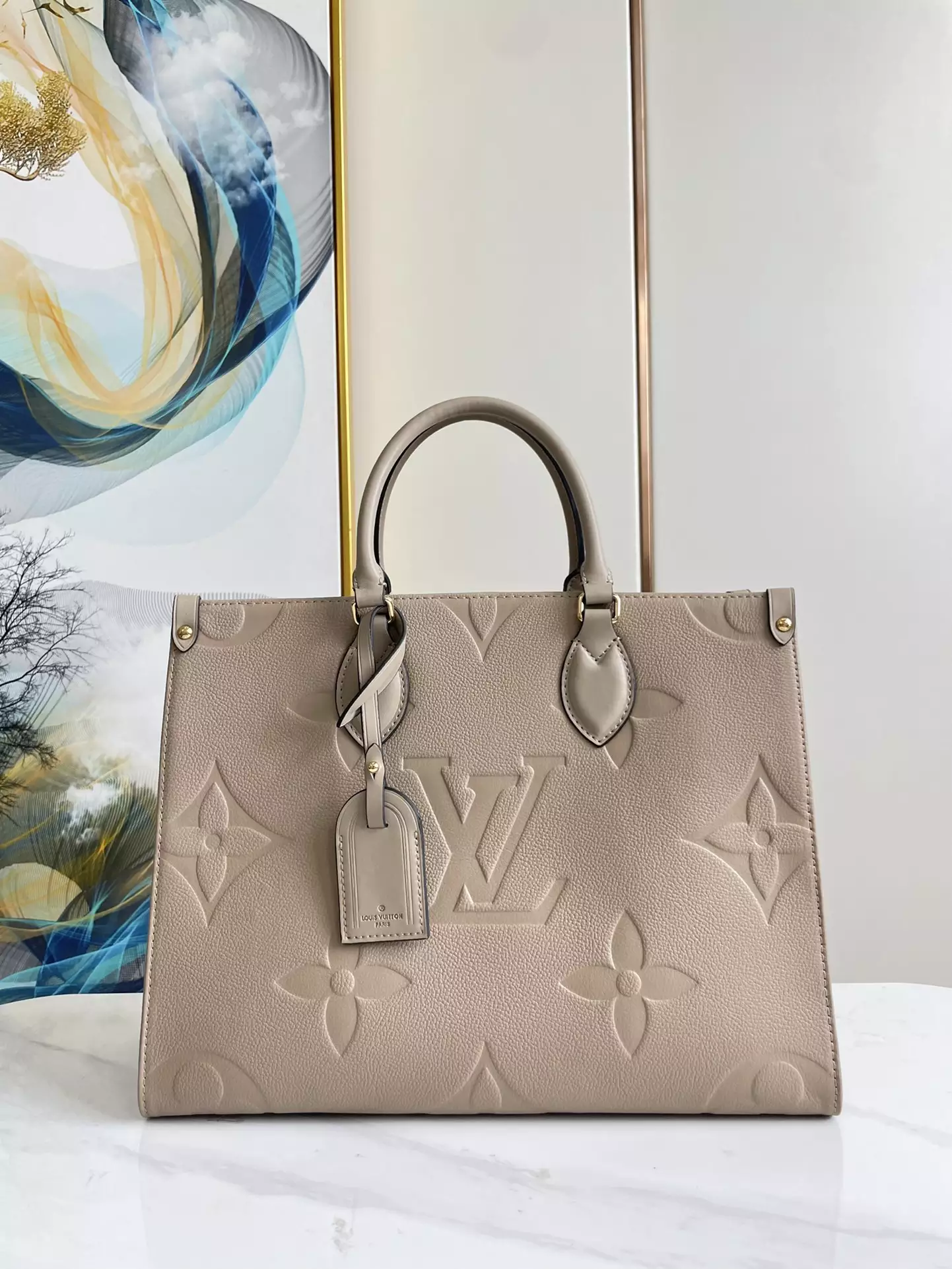 OnTheGo MM Monogram Empreinte Dune Leather