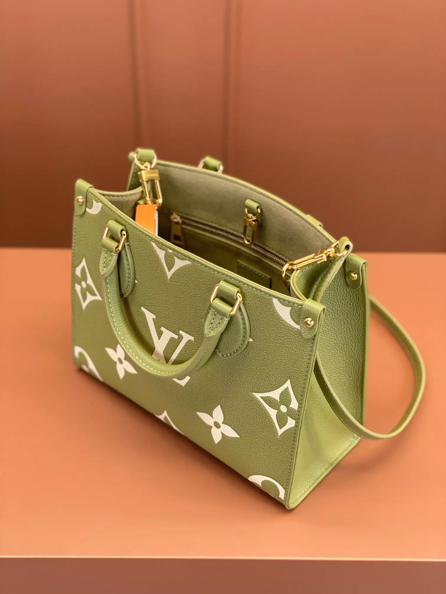 OnTheGo PM Bicolor Monogram Empreinte Light Khaki/Cream Leather
