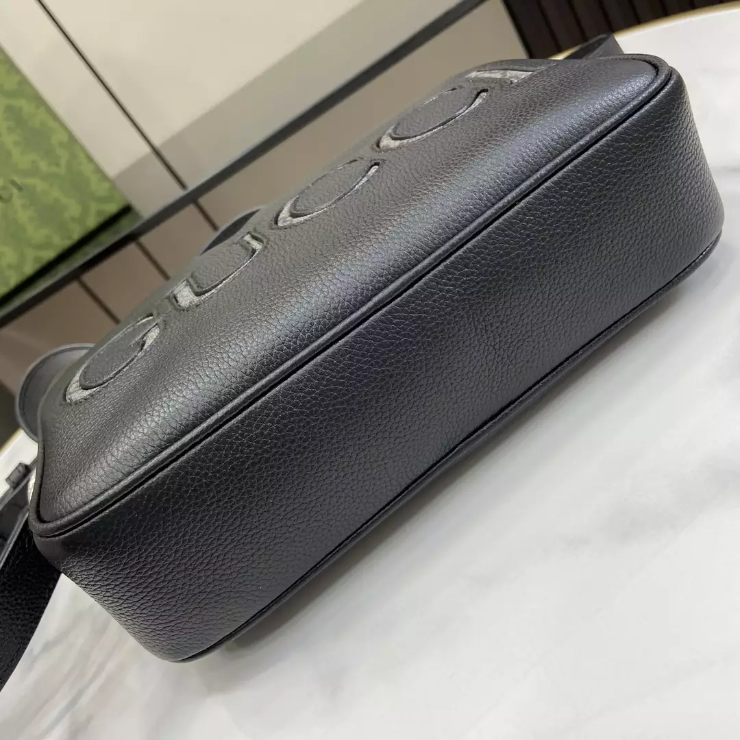 G*u*i mini shoulder bag in black leather