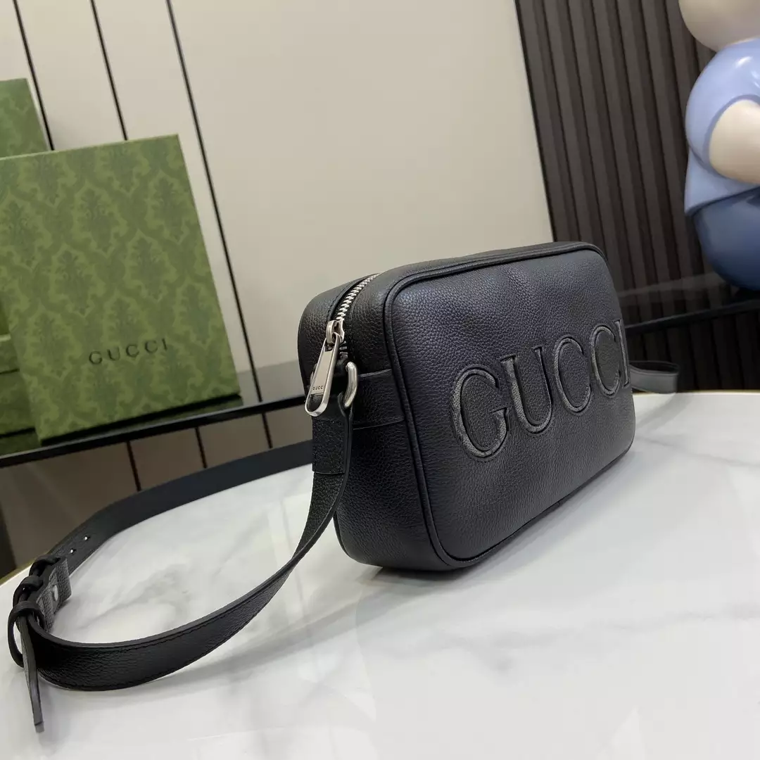 G*u*i mini shoulder bag in black leather