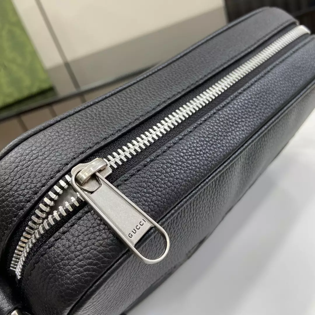 G*u*i mini shoulder bag in black leather