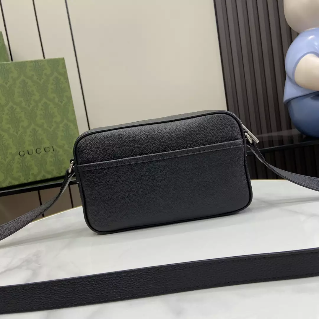 G*u*i mini shoulder bag in black leather
