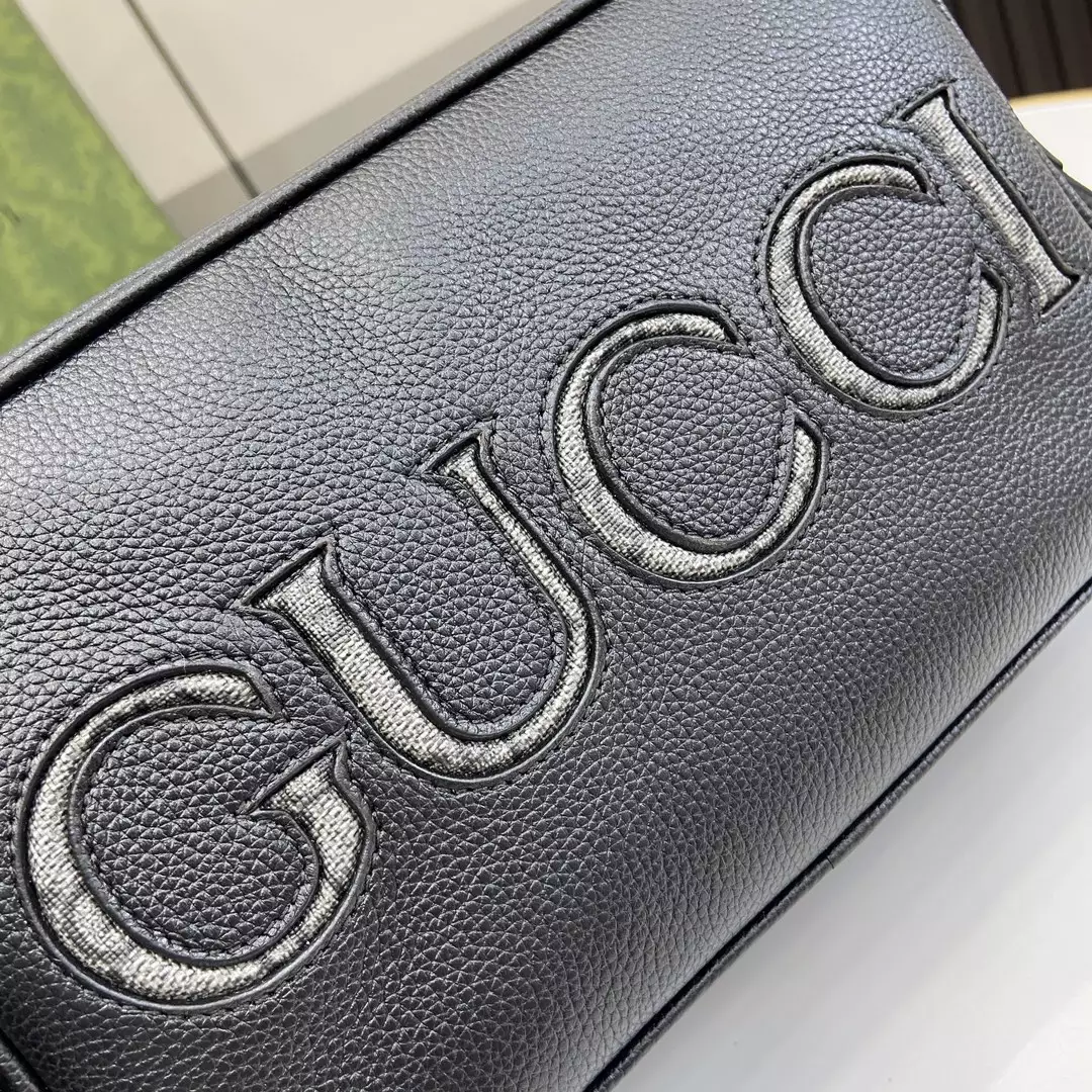 G*u*i mini shoulder bag in black leather